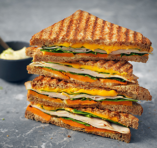 Toastie with cheddar, chicken breast, spinach, sweet potato and lime mayonnaise