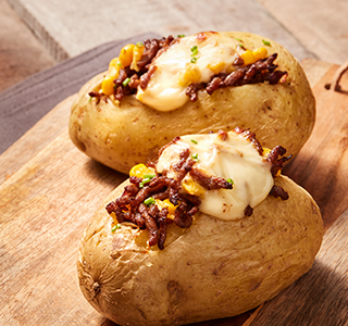 Baked potato with mince and sweet corn