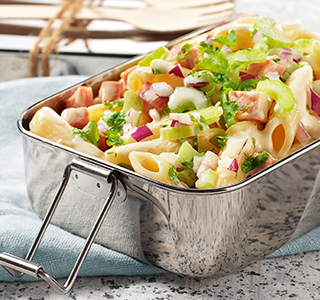 Pasta salad with diced ham, red onion and celery