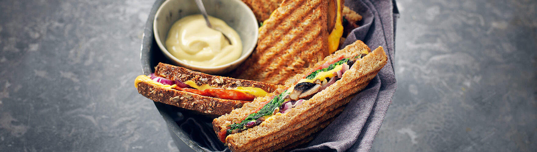 Toastie with cheddar, salami, portobello, spinach and truffle mayonnaise