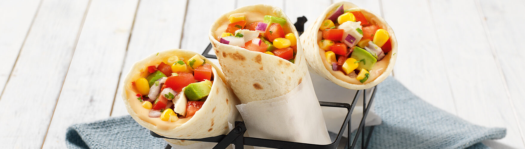 Wraps with smoked chicken, avocado and sweet corn salsa