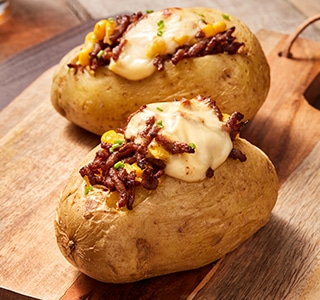 Baked potato with mince and sweet corn